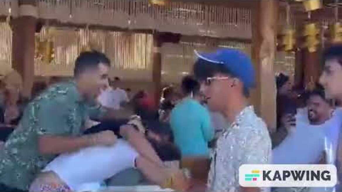 Mo Salah Video Shows Moment He Signs New 3 Year Liverpool COntract Surrounding by Friends