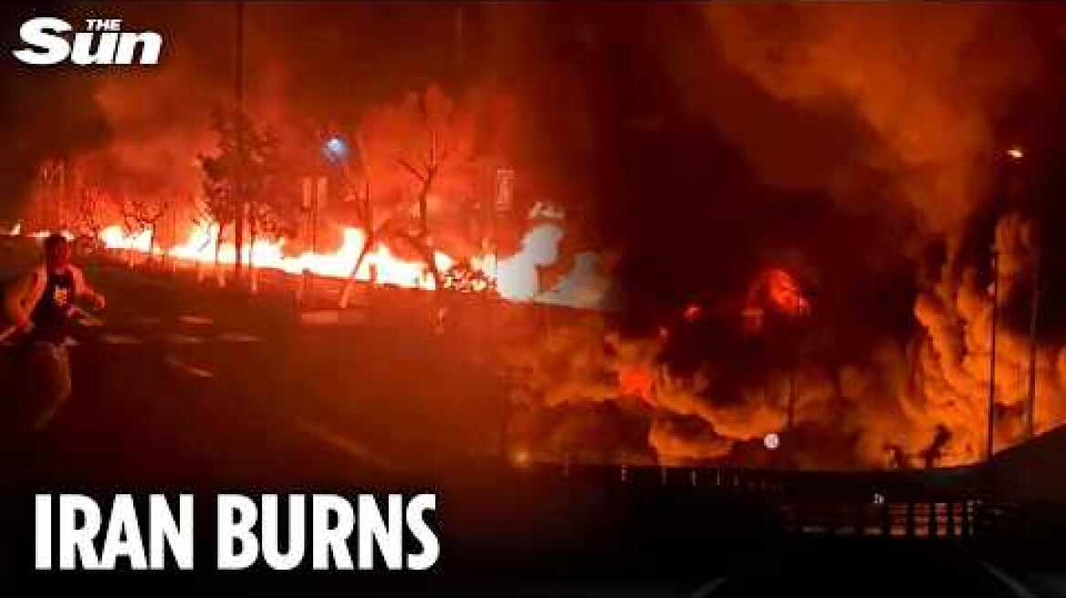 Terrifying moment ‘RIVER OF FIRE’ flows through Tehran after oil depot blitz