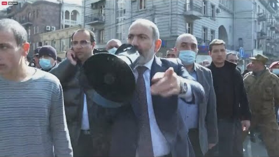 Armenian PM marches through capital with hundreds of supporters | AFP