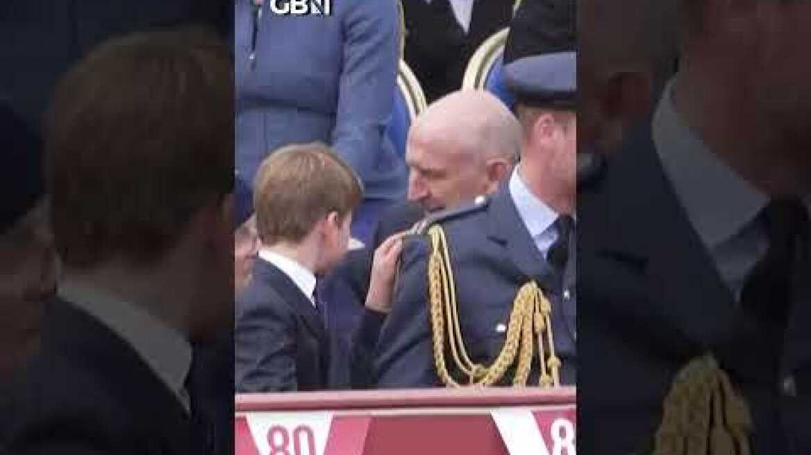 ADORABLE MOMENT Prince Louis tries desperately to get Prince William's attention