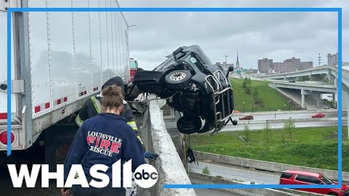 FULL: Semi driver's terrifying 911 call while hanging over Louisville bridge