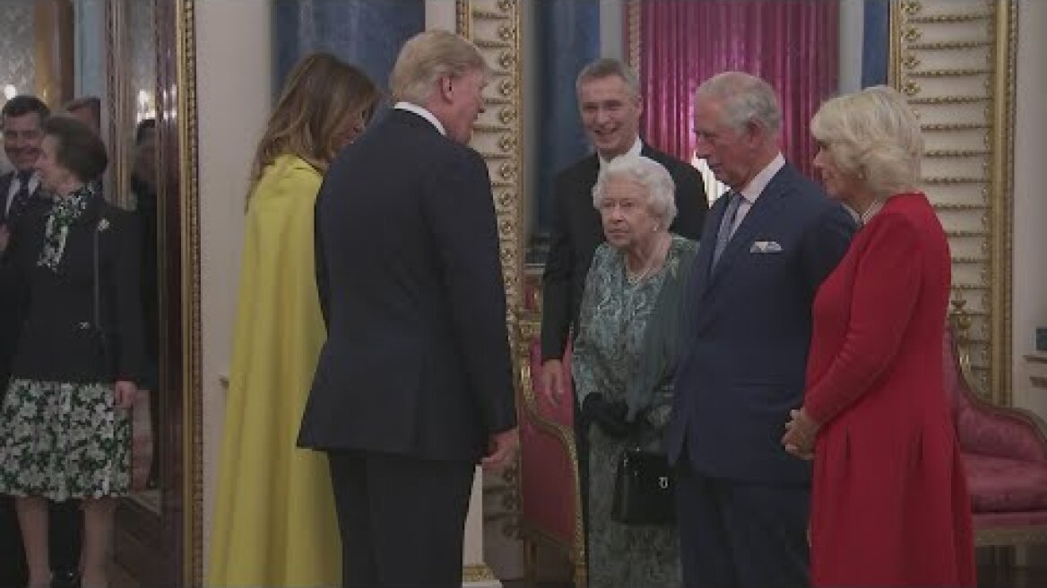 The Queen greets President Trump and First Lady at NATO reception in Buckingham Palace