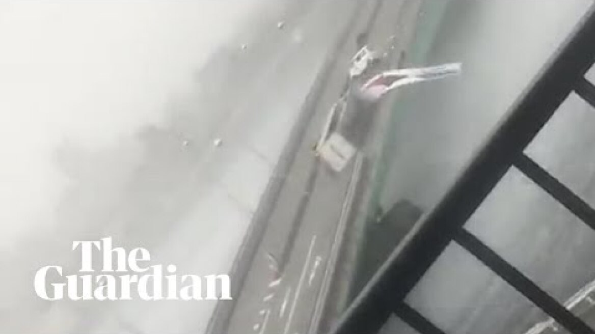 Typhoon winds overturn truck on bridge in Japan