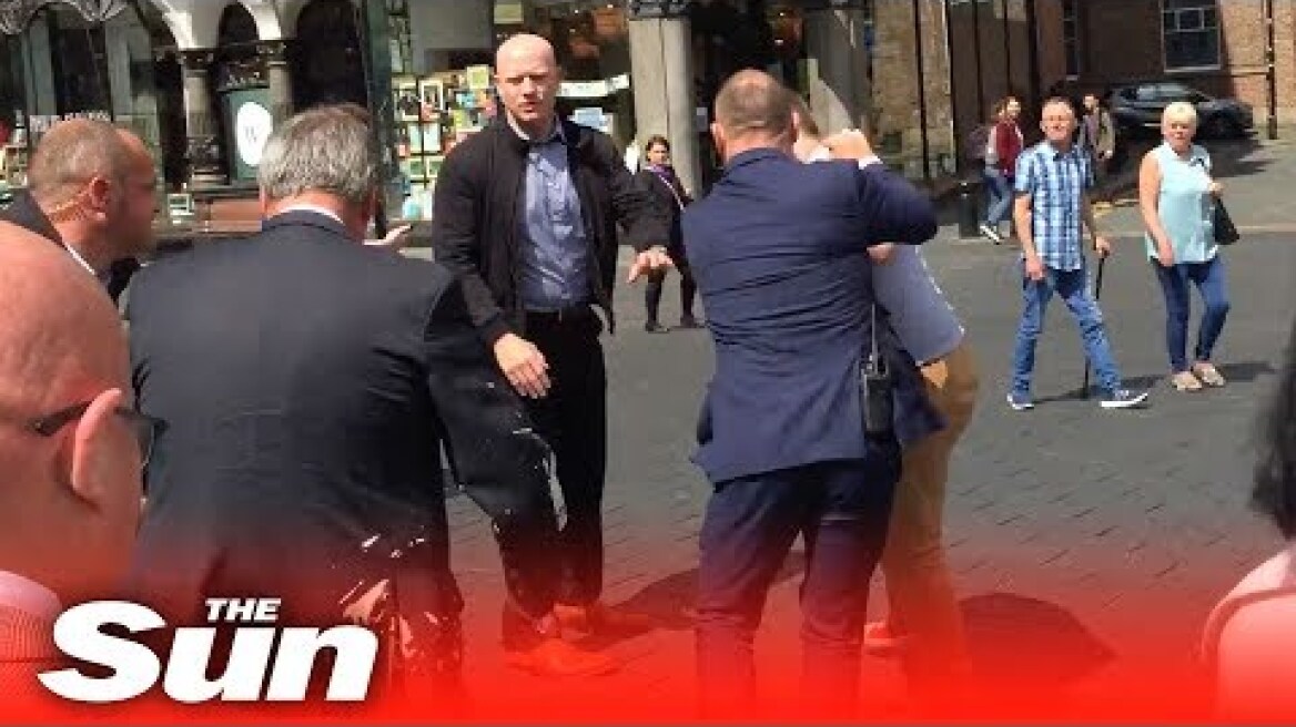 Moment Nigel Farage gets hit by a milkshake in Newcastle