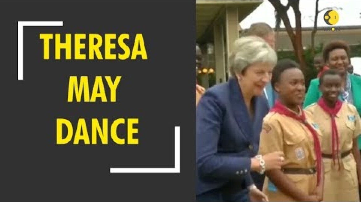 Theresa May caught dancing on last day of African trip