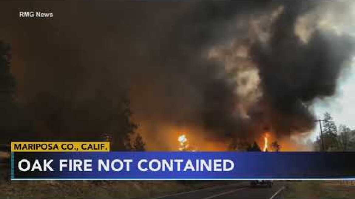 Crews protect homes as California fire burns near Yosemite