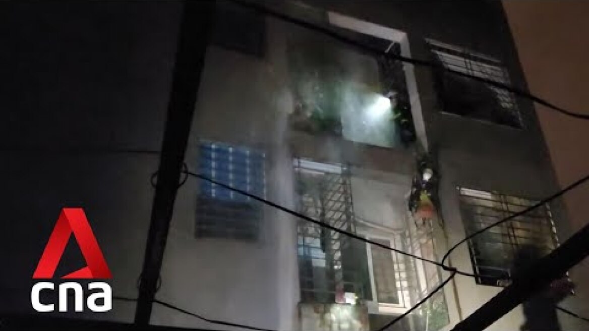 At least 30 dead after blaze in Hanoi residential building