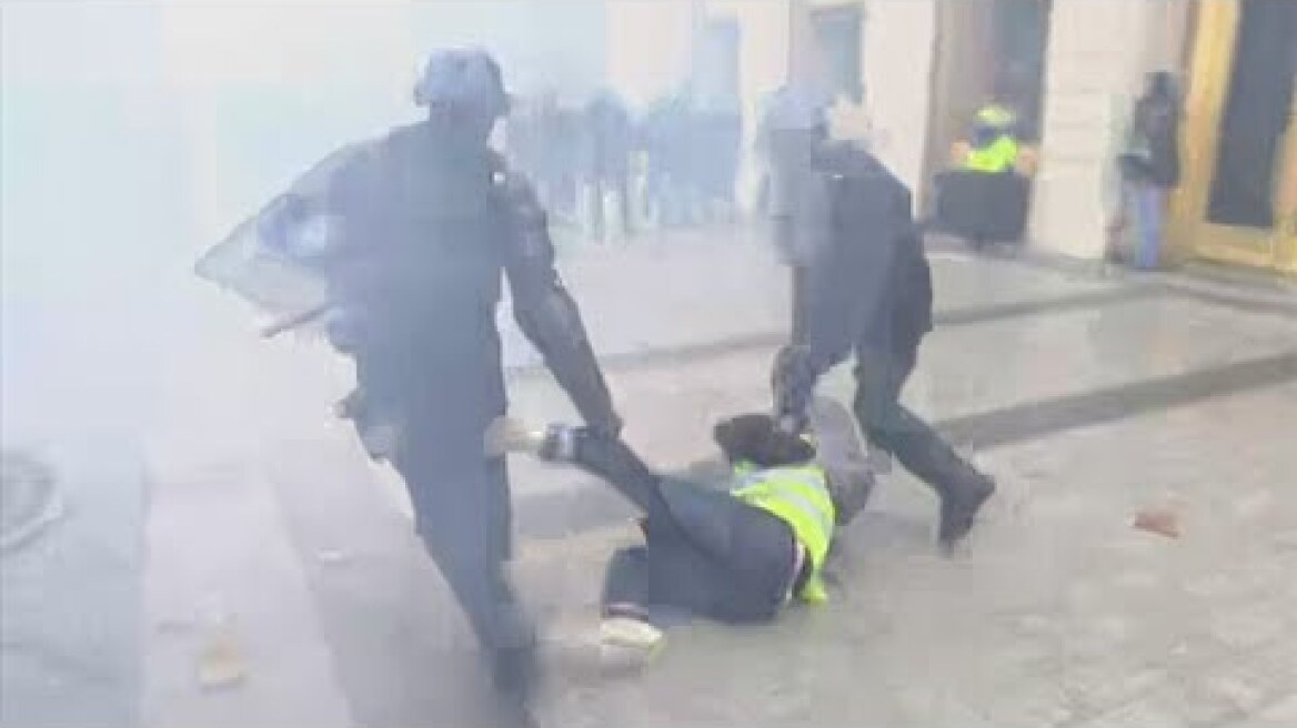 Paris fuel protests: Riot police use water cannons