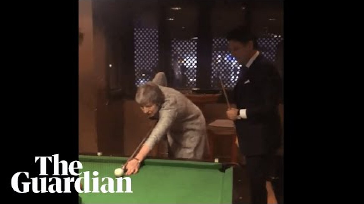 Italian PM Giuseppe Conte challenges Theresa May to a game of pool