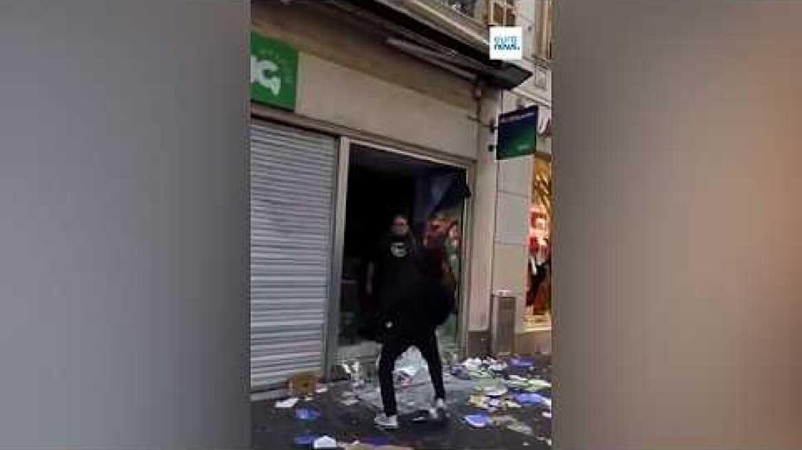 Shopkeepers defend their livelihood from masked looters during the French riots