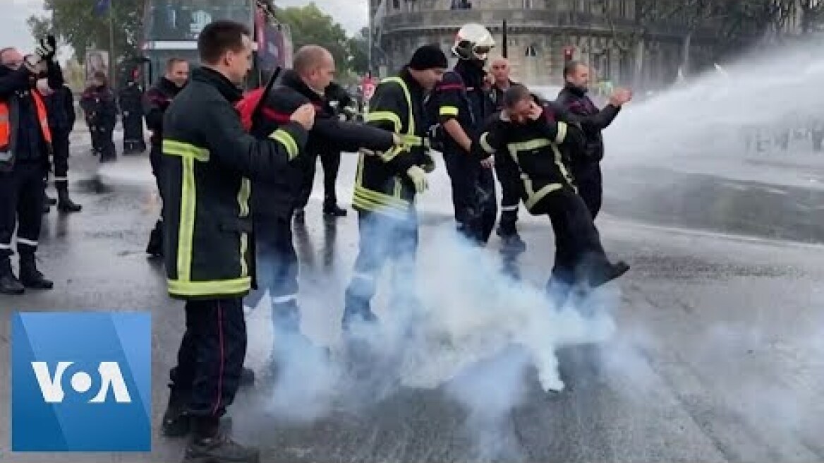 Police Fire Water Cannon at Protesting Firefighters in France