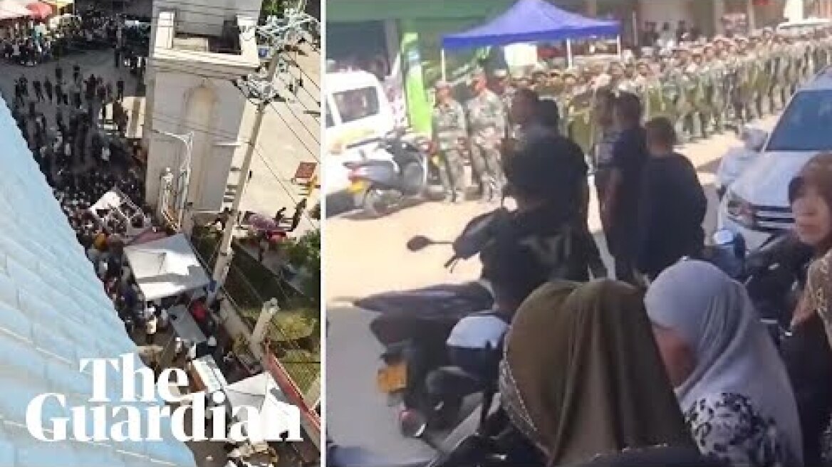 Protesters clash with police outside mosque in China