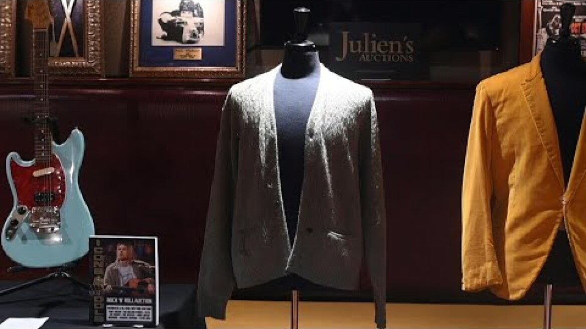 Cigarette-burned Kurt Cobain 'Unplugged' cardigan heading to auction | AFP