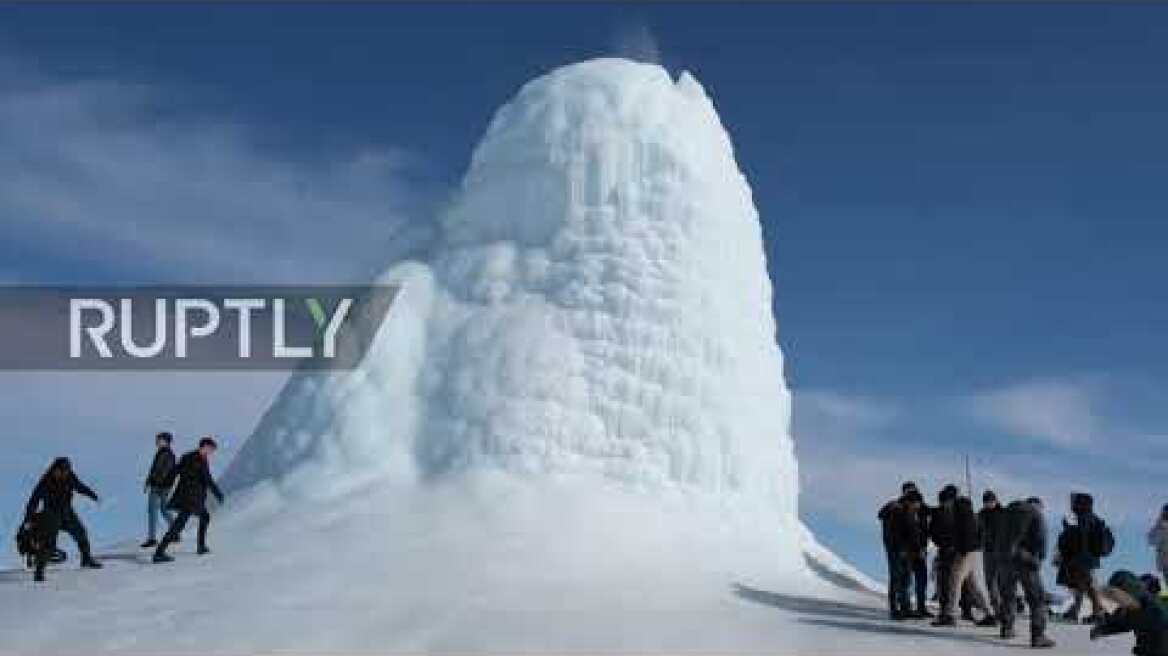 Kazakhstan: Unusually shaped ice "volcano" grows as cold weather sets in