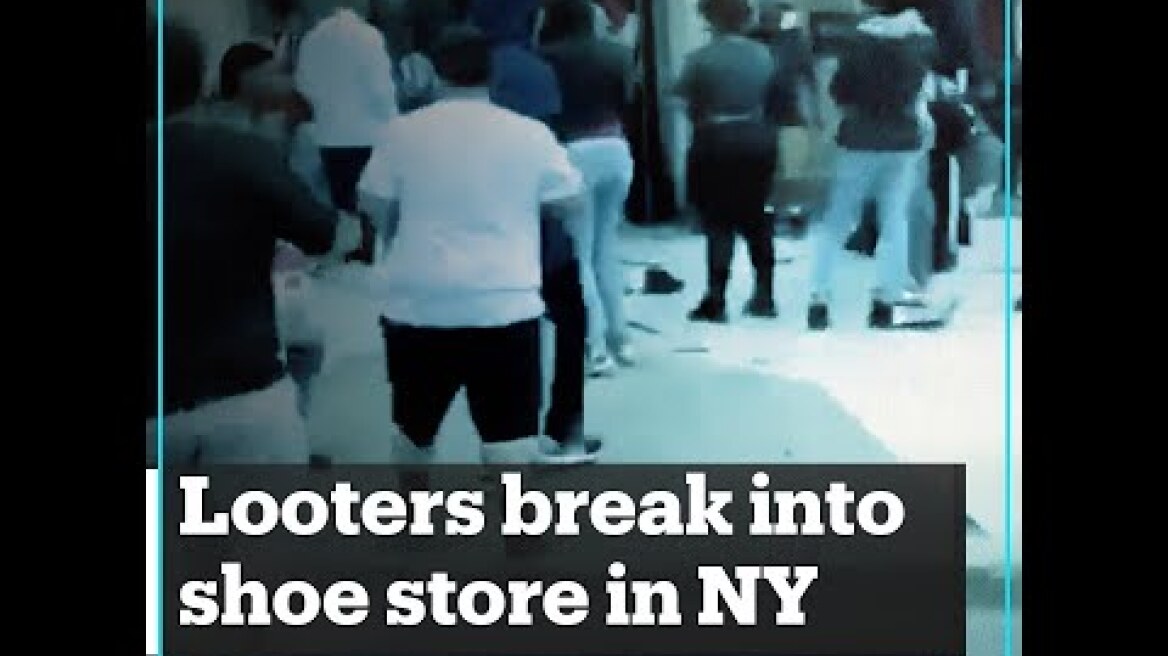 Looters break into a shoe store in New York, US