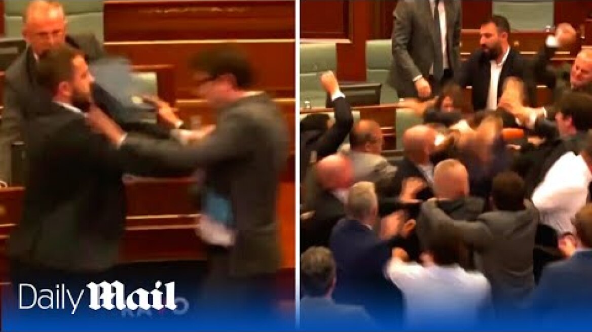 Shocking moment Kosovo parliament erupts into mass brawl after Prime Minister's speech