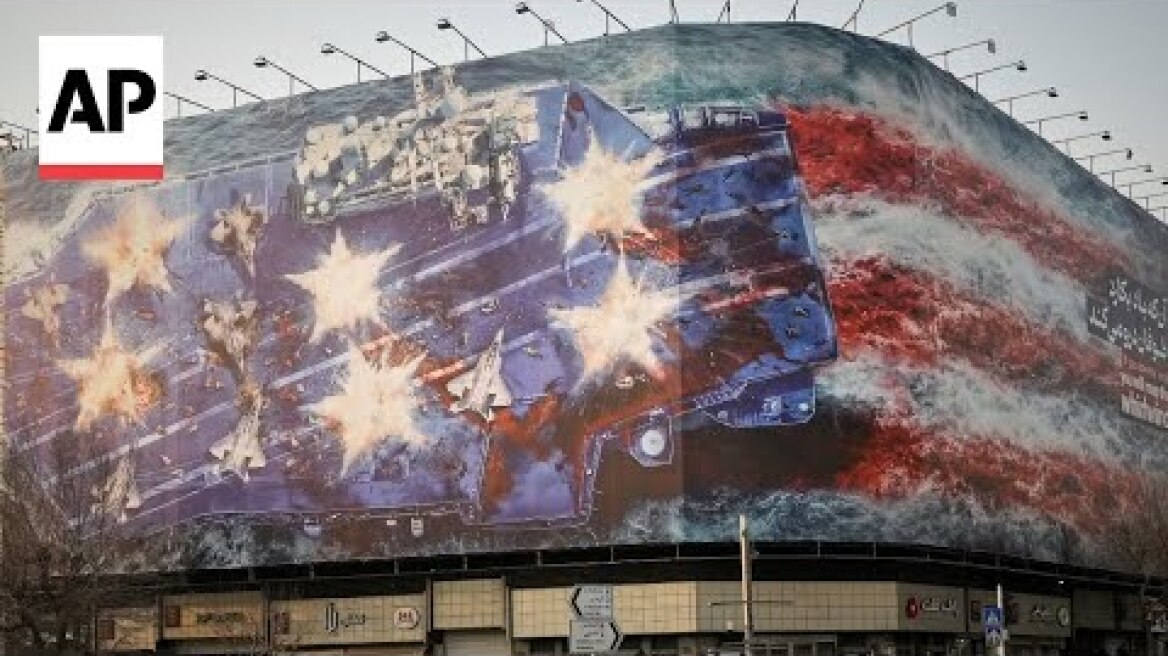 Iran unveils mural warning of retaliation if US conducts a military strike