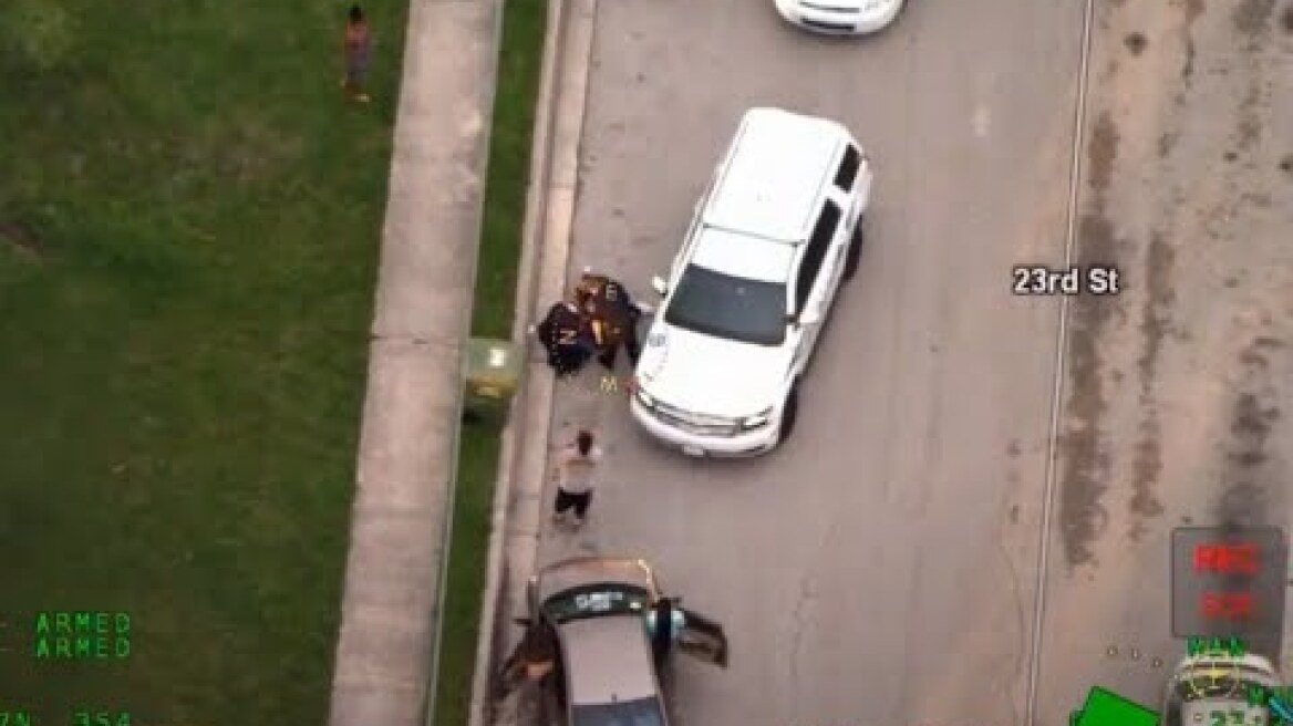 Aerial video of Sarasota police officer kneeling on man | Herald-Tribune