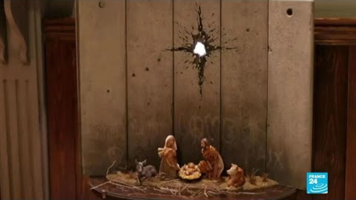Anonymous British artist Banksy unveils dark nativity scene in Belthlehem