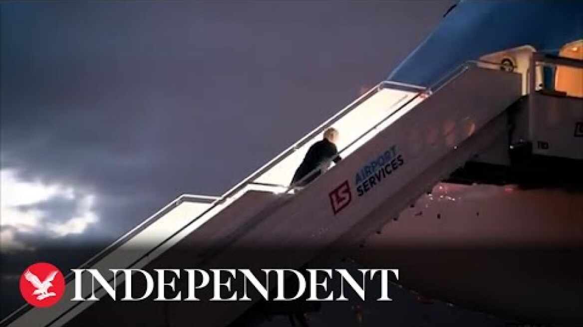 Joe Biden stumbles up steps of Air Force 1 in Poland