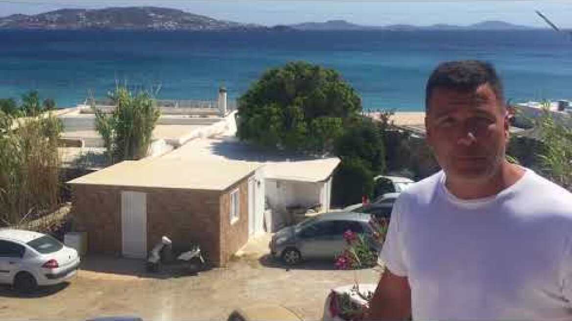 Στη Μύκονο καμουφλάρουν τα κοντέινερ... με πέτρινες ταπετσαρίες!