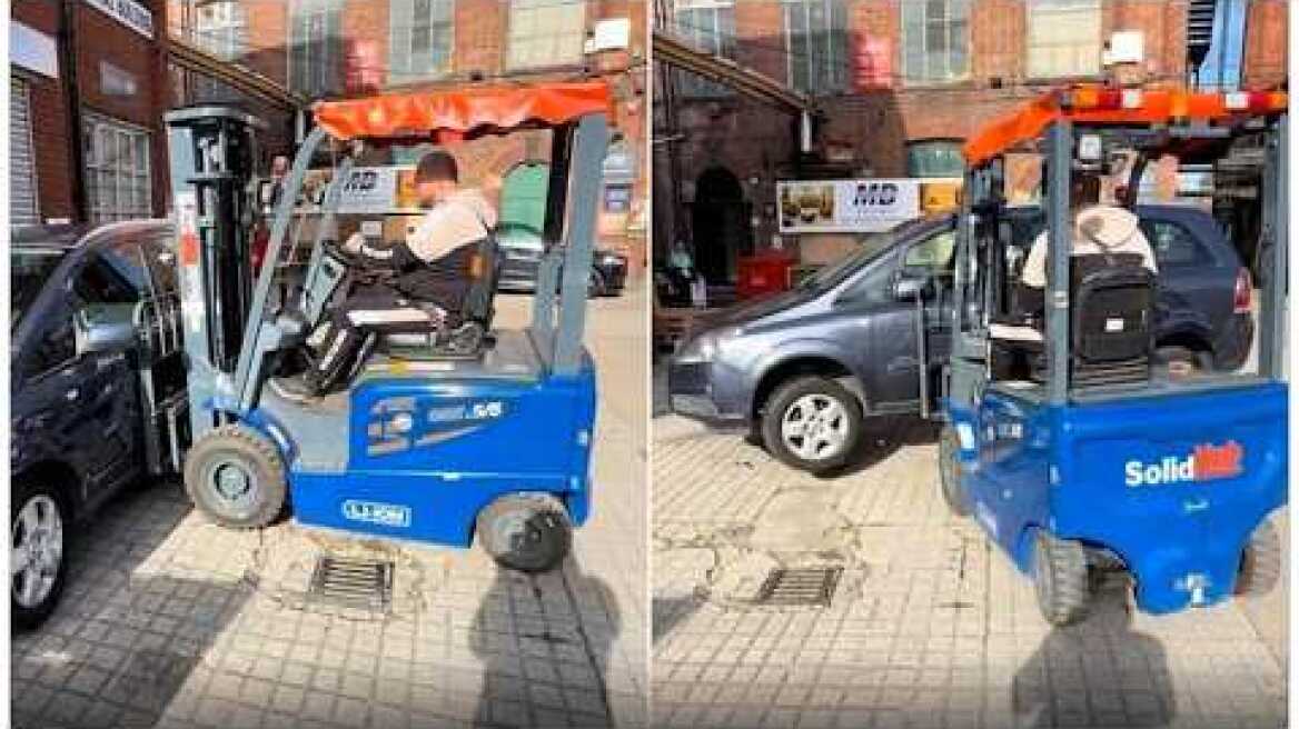 Business owner takes forklift to car parked in front of shop