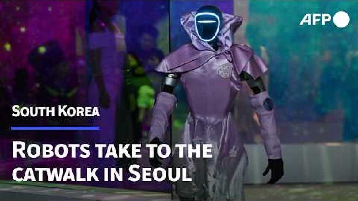 Humanoid robots strut their stuff at Seoul fashion show | AFP