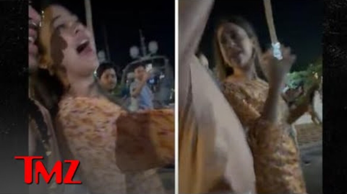 Bad Bunny Angrily Throws Fan's Phone In The Water | TMZ LIVE