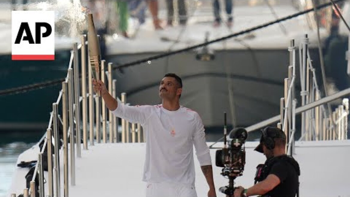 Olympic swimmer Florent Manaudou became first Olympic torch carrier in France