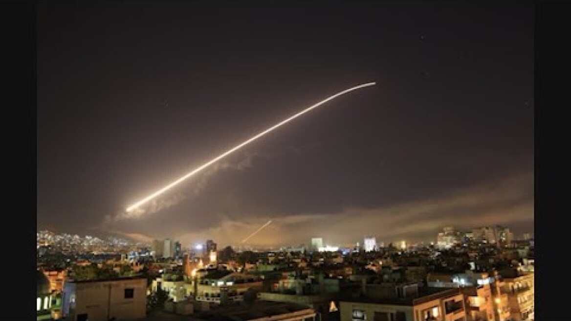 Raw: Flares Launched into Skies Above Damascus