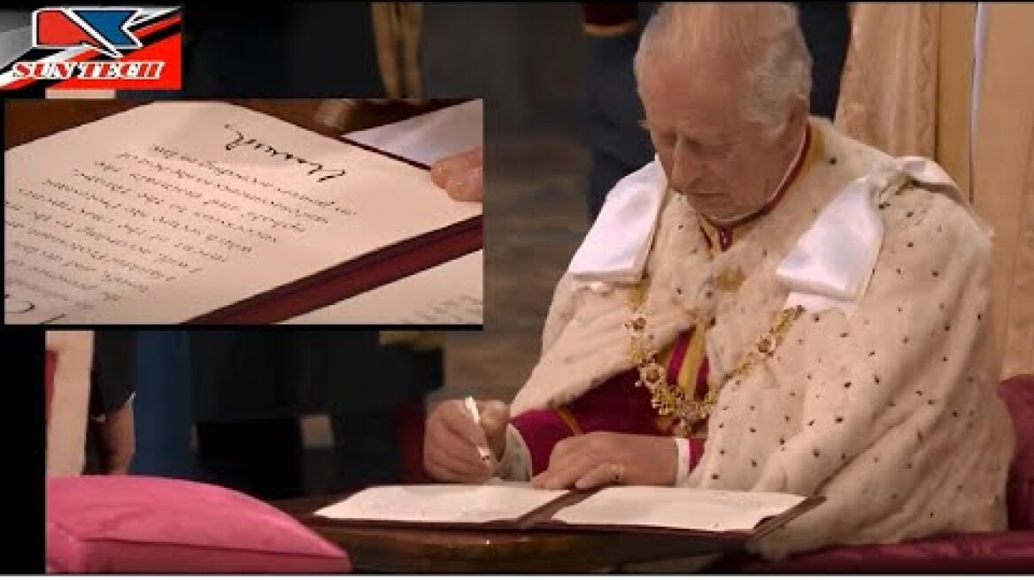 King Charles III signs his Coronation Oath.
