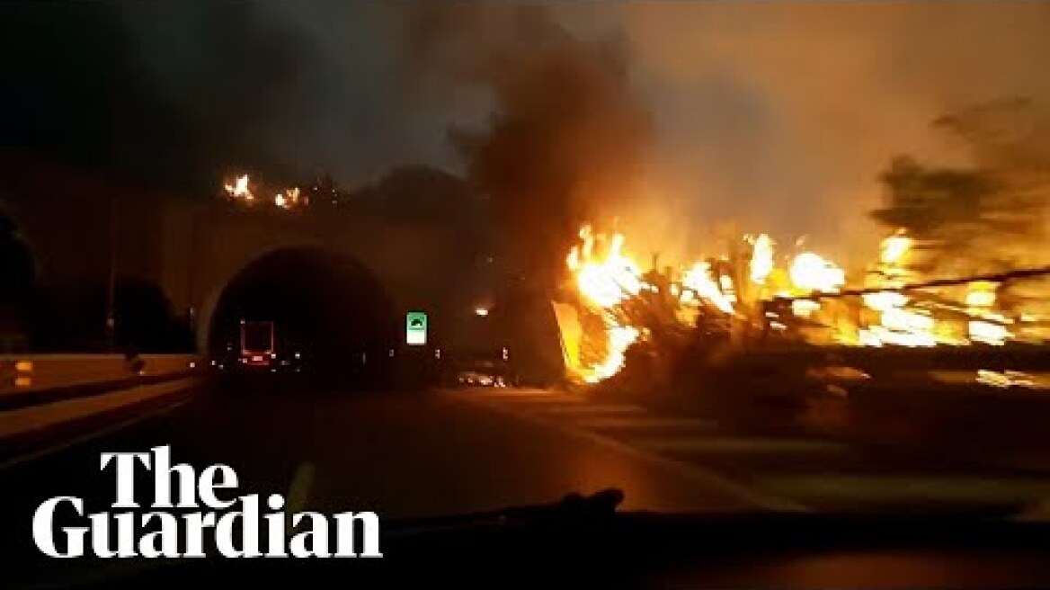 Motorist captures highway in Palermo engulfed in flames as wildfires hit southern Italy