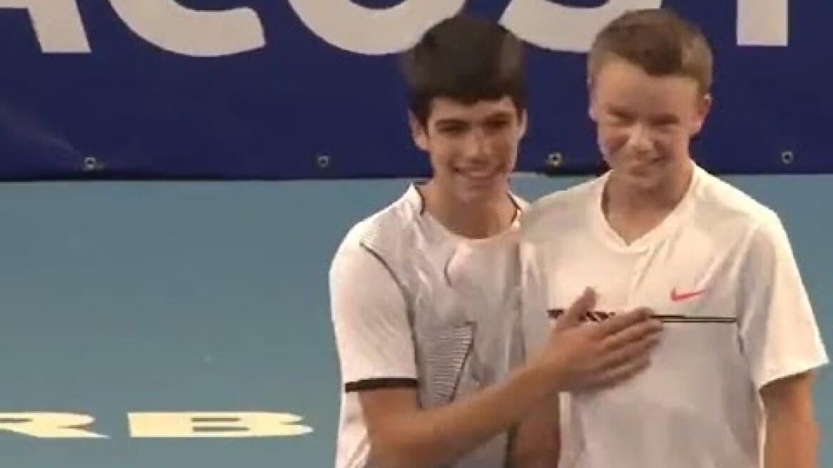 Young Carlos Alcaraz and Holger Rune playing together doubles
