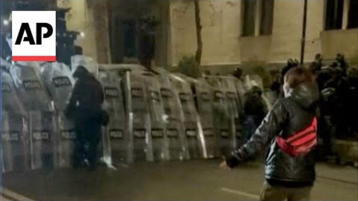 Woman confronts riot police as mass protests continue in Tbilisi, Georgia