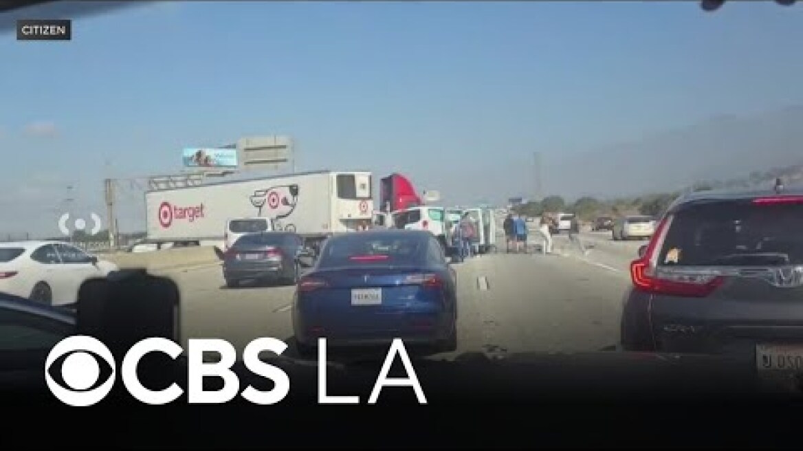 1 dead, dozens injured after semi-truck crashes through 210 Freeway center divider