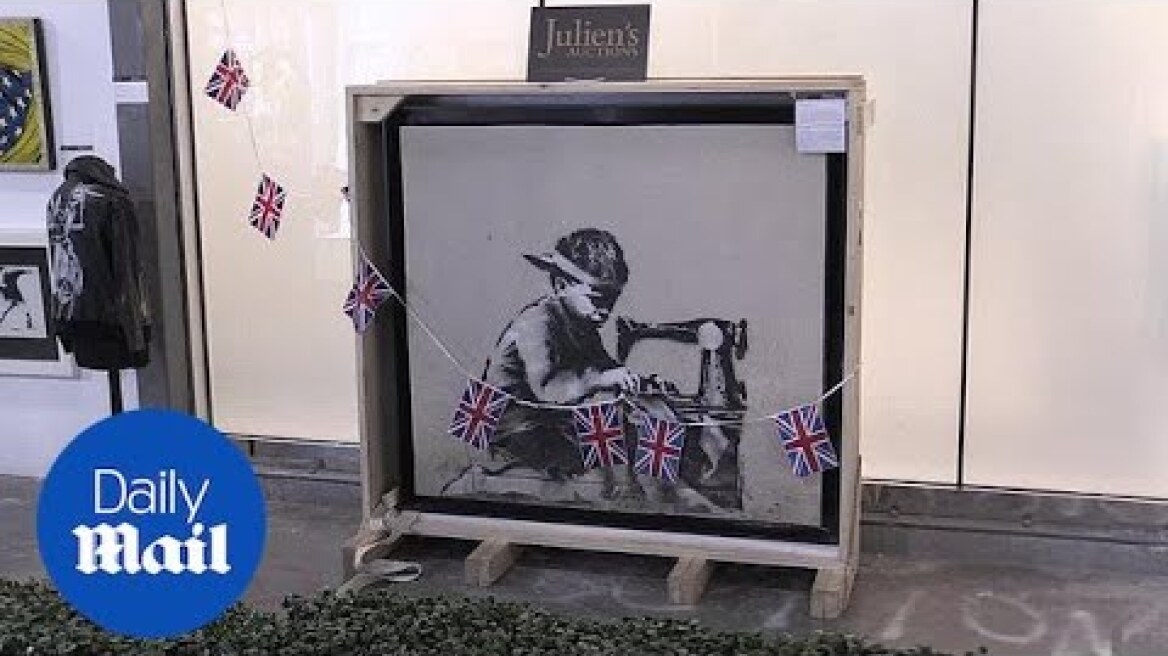 American artist buys Banksy painting then vows to whitewash it