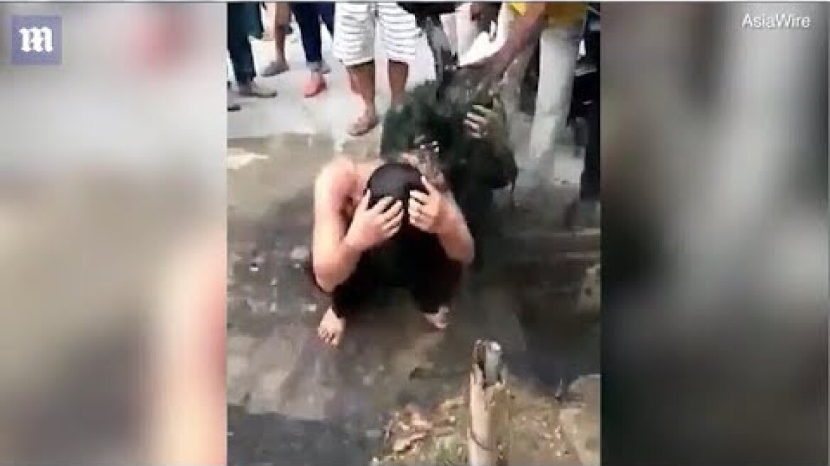 SEWAGE dumped over couple accused of having sex outside of marriage