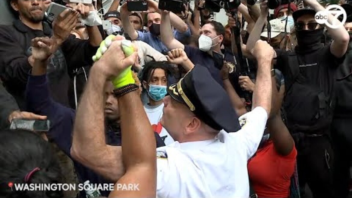 NYC's highest-ranking uniformed member takes a knee, hugs George Floyd protesters