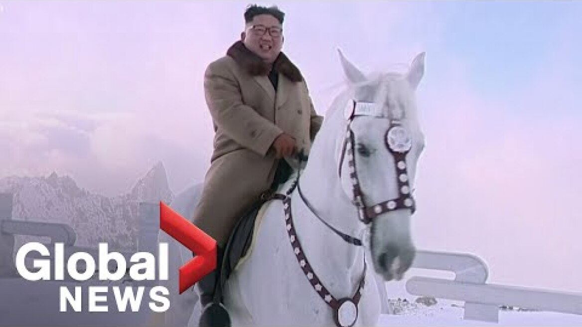 North Korea state TV airs new video of Kim Jong Un riding horse up sacred mountain with aids