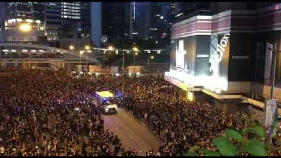 Hong Kong protestors part for ambulance