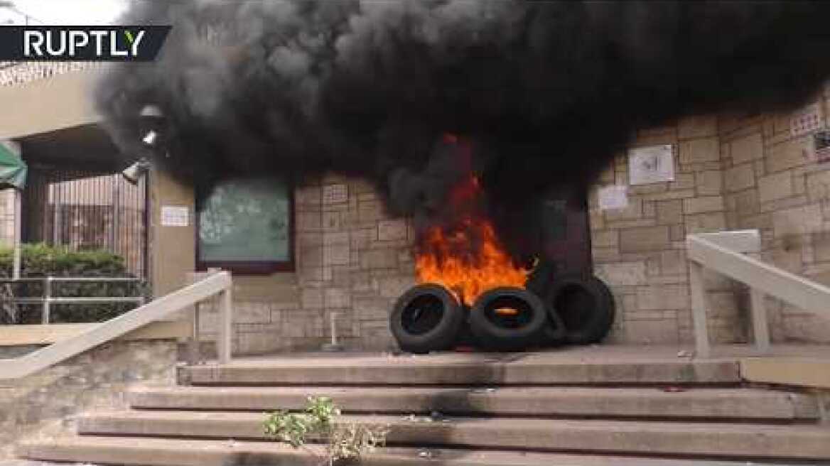 Protesters set door of US embassy on fire in Honduras amid anti-govt rallies