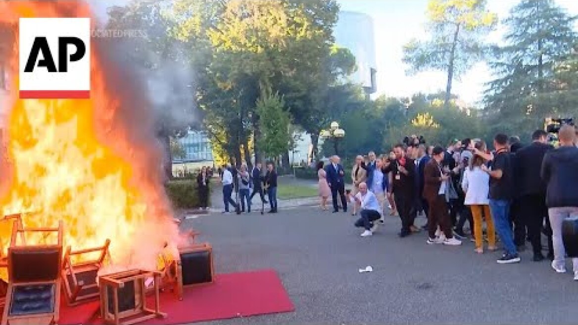 Albanian opposition violently interrupt parliament after lawmaker is jailed