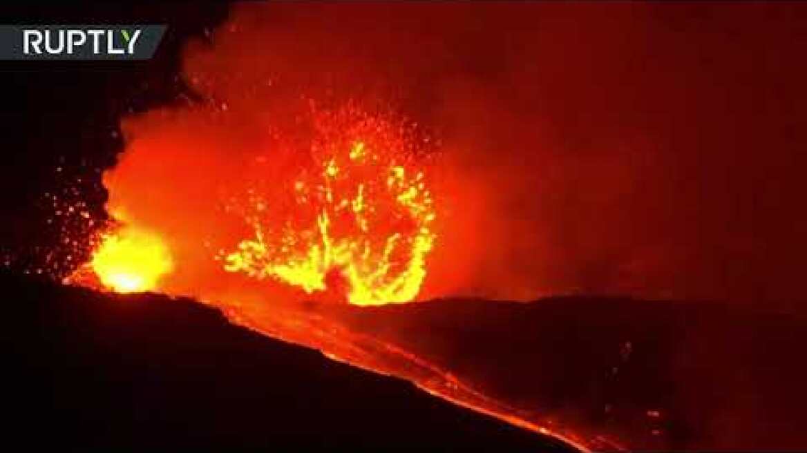 Fiery beauty: Mount Etna spews dual flows of lava