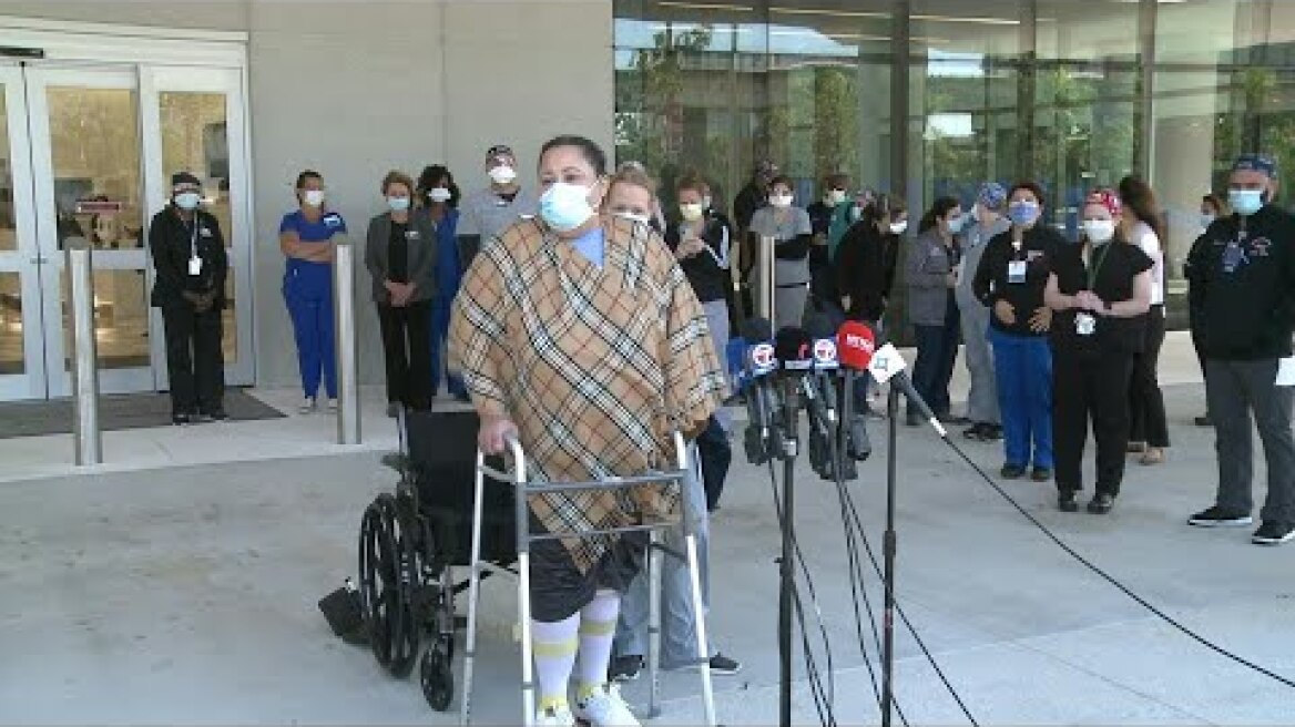 Florida health worker who survived Covid-19 leaves hospital after nine months | AFP