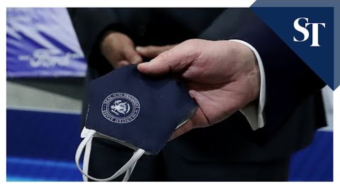 Trump holds mask at Ford plant, but doesn't wear it on camera