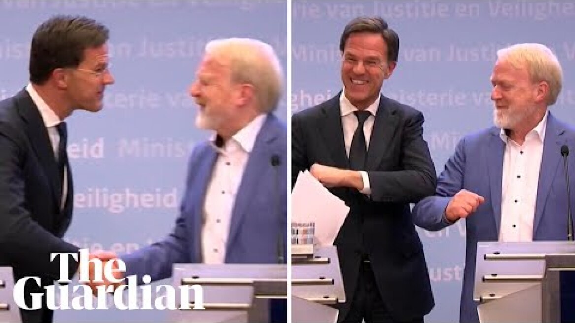 'Sorry!': Dutch PM breaks own 'no handshake' rule at coronavirus conference