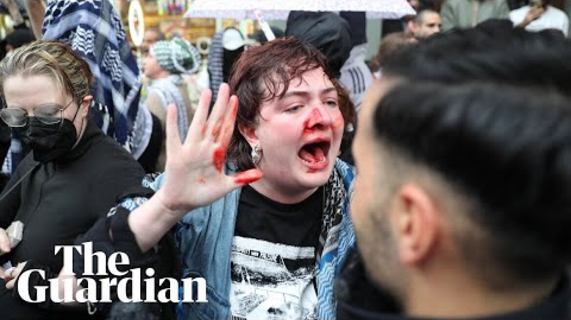 Police officer punches activist in the face during Berlin protest