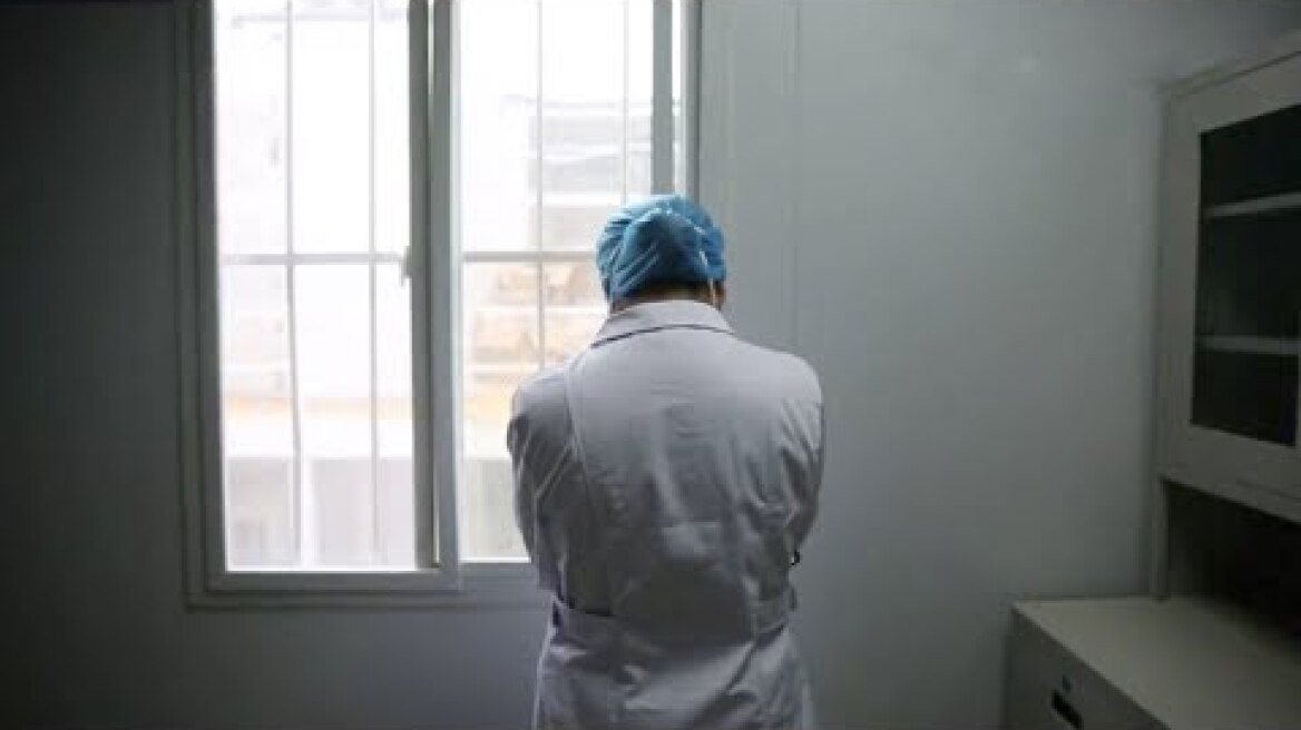 Touching moment: Chinese nurse working in Wuhan hospital hears of her mother's sudden death