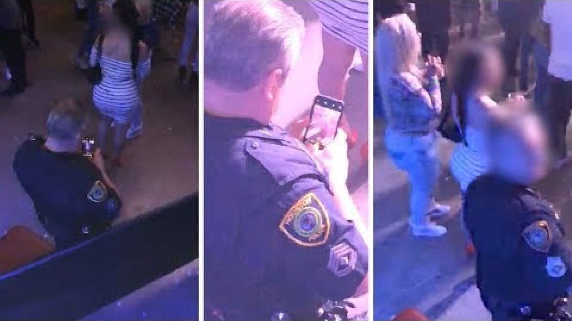 Police Officer Caught Taking Picture Of Woman's Bum At Concert