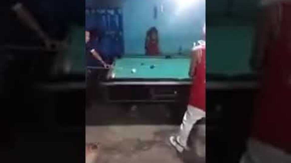 Loser uses a gun after a game of pool